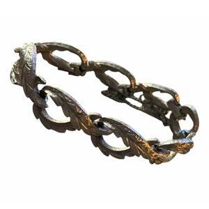 Monet Signed Silver Tone Interlocking Wings Bracelet